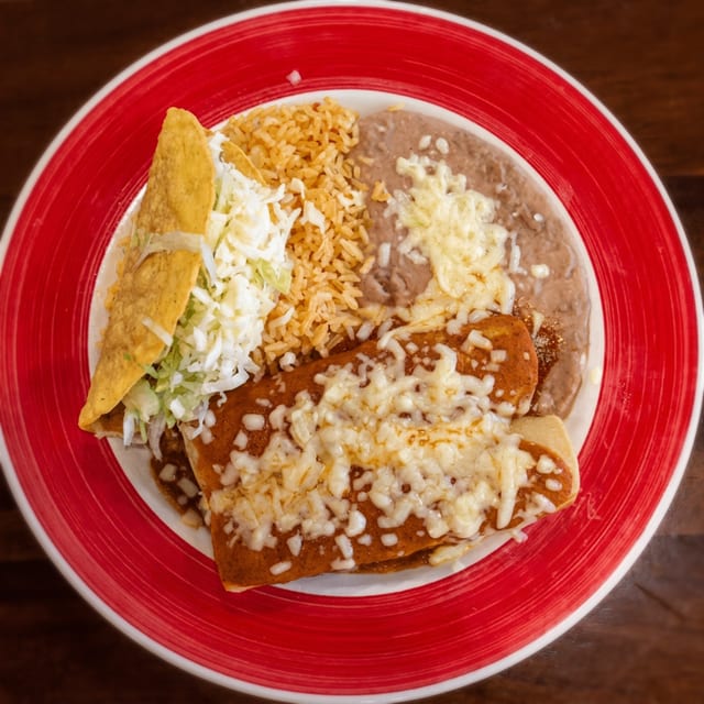 Two Enchiladas, Taco, Rice & Beans.
